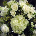 All white, round centerpiece.