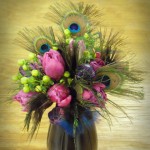 Fuschia Tulips with peacock feathers.
