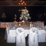 Intimate setting featuring high-style all white arrangements.