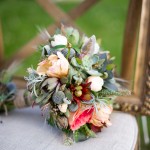 Succulent bouquet with French tulips, Garden Roses, Peony buds, and metallic Billy Balls.