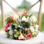 Garden flowers, succulents, and metallic accents mix in this bouquet.