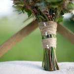 Twine and coupled pearl pinheads finish this bohemian and rustic yet refined bouquet.