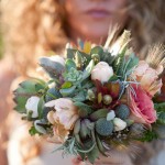 Sunlight highlights the various textures of this succulent bouquet.