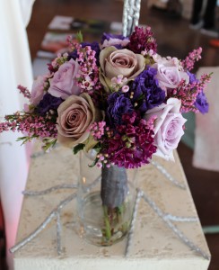 Shades of purple bouquet with lavender Roses, Heather, Hyacinth, and Lizianthus.