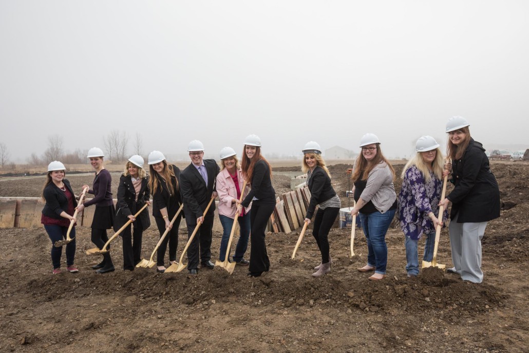 Event Floral staff and team members participate in a ceremonial dig.