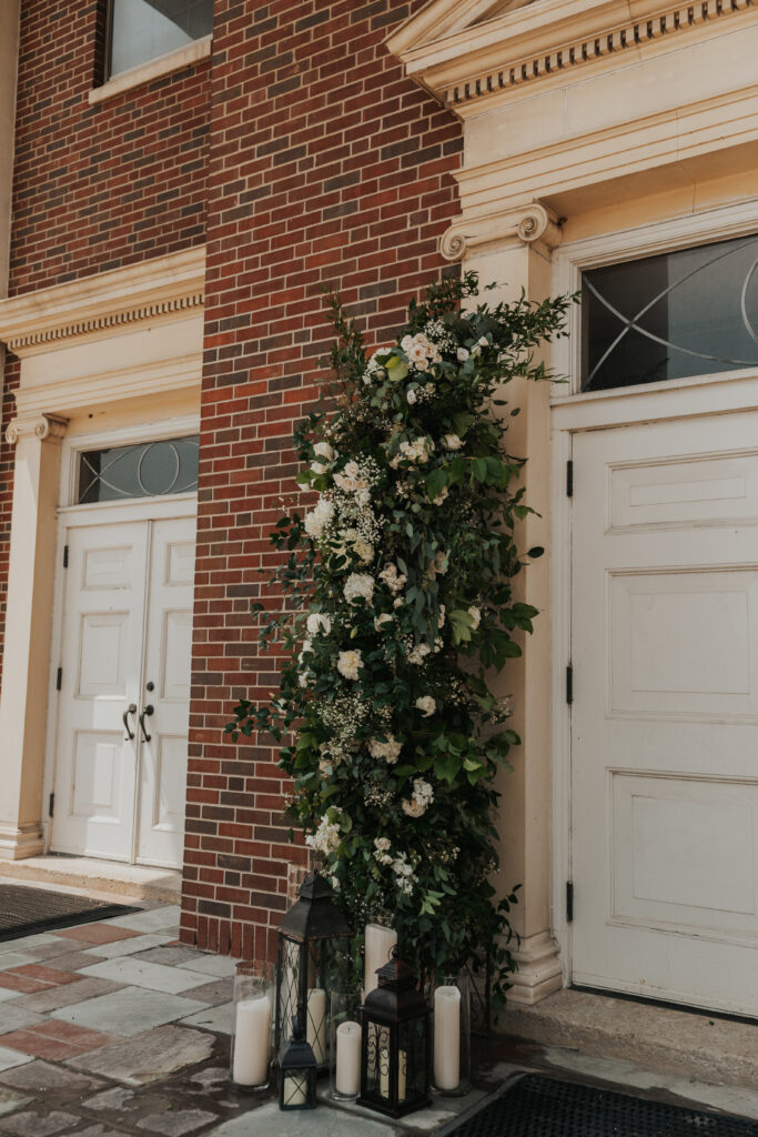 Wedding flowers and lanterns with candles